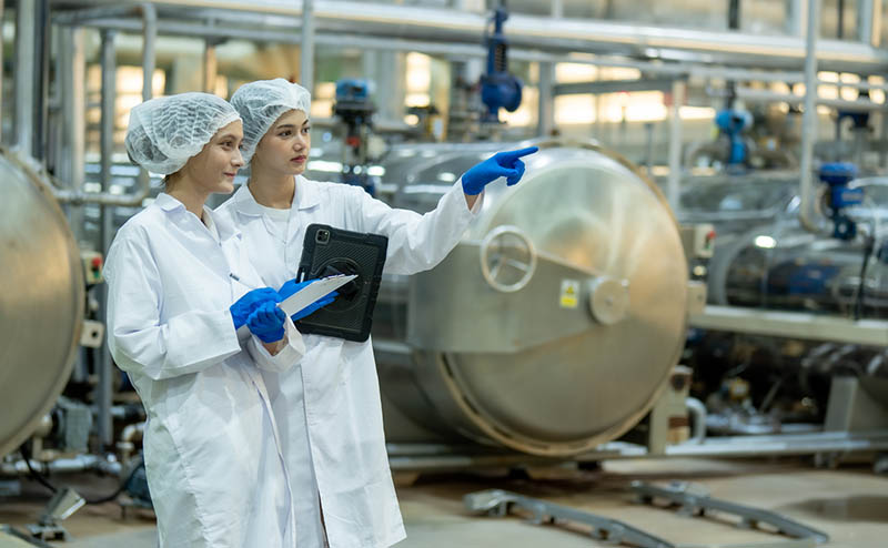 people in a food manufacturing facility