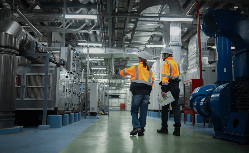 engineers examining industrial hvac