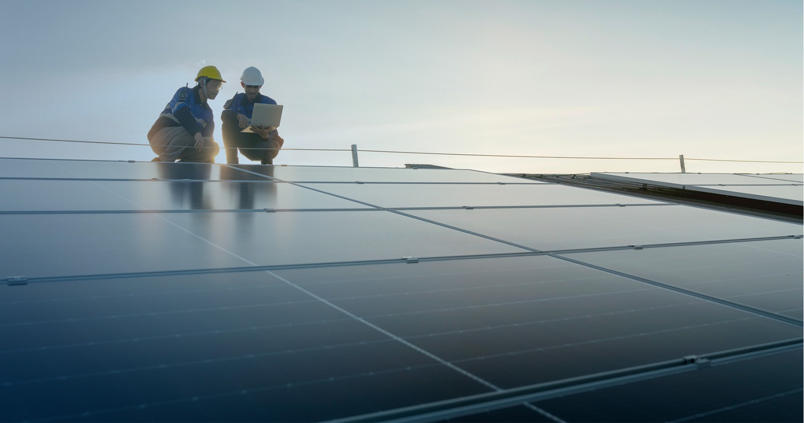 solar technicians inspect solar installation