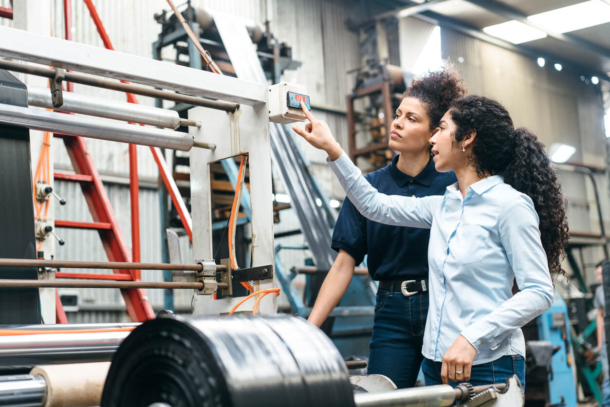 two women in manufacturing facility